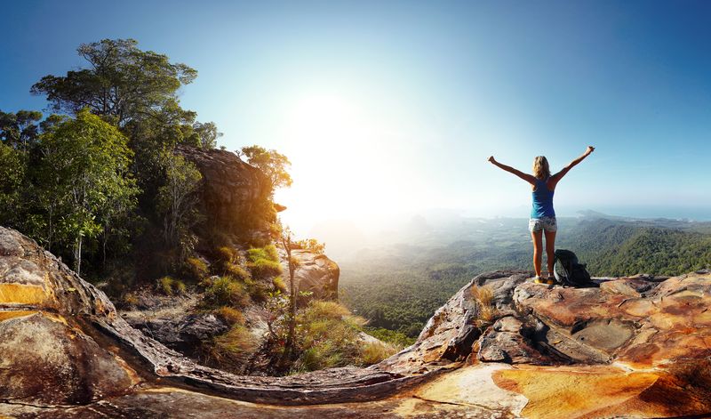 traveler on mountaintop